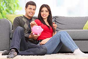 Couple money in piggy bank showing the benefits of cds