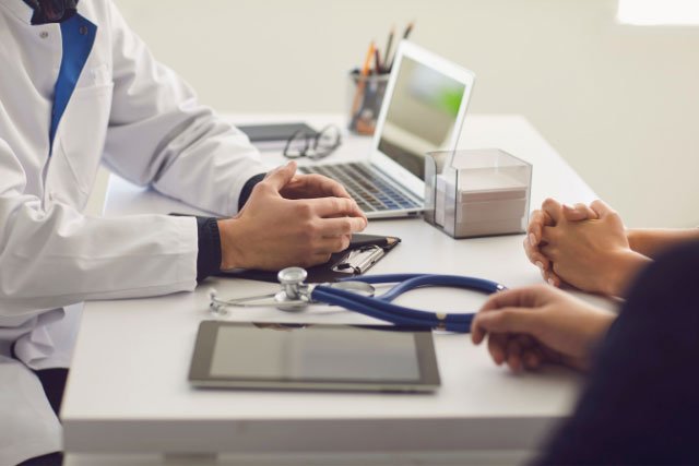 Doctor discussing health savings accounts with a patient